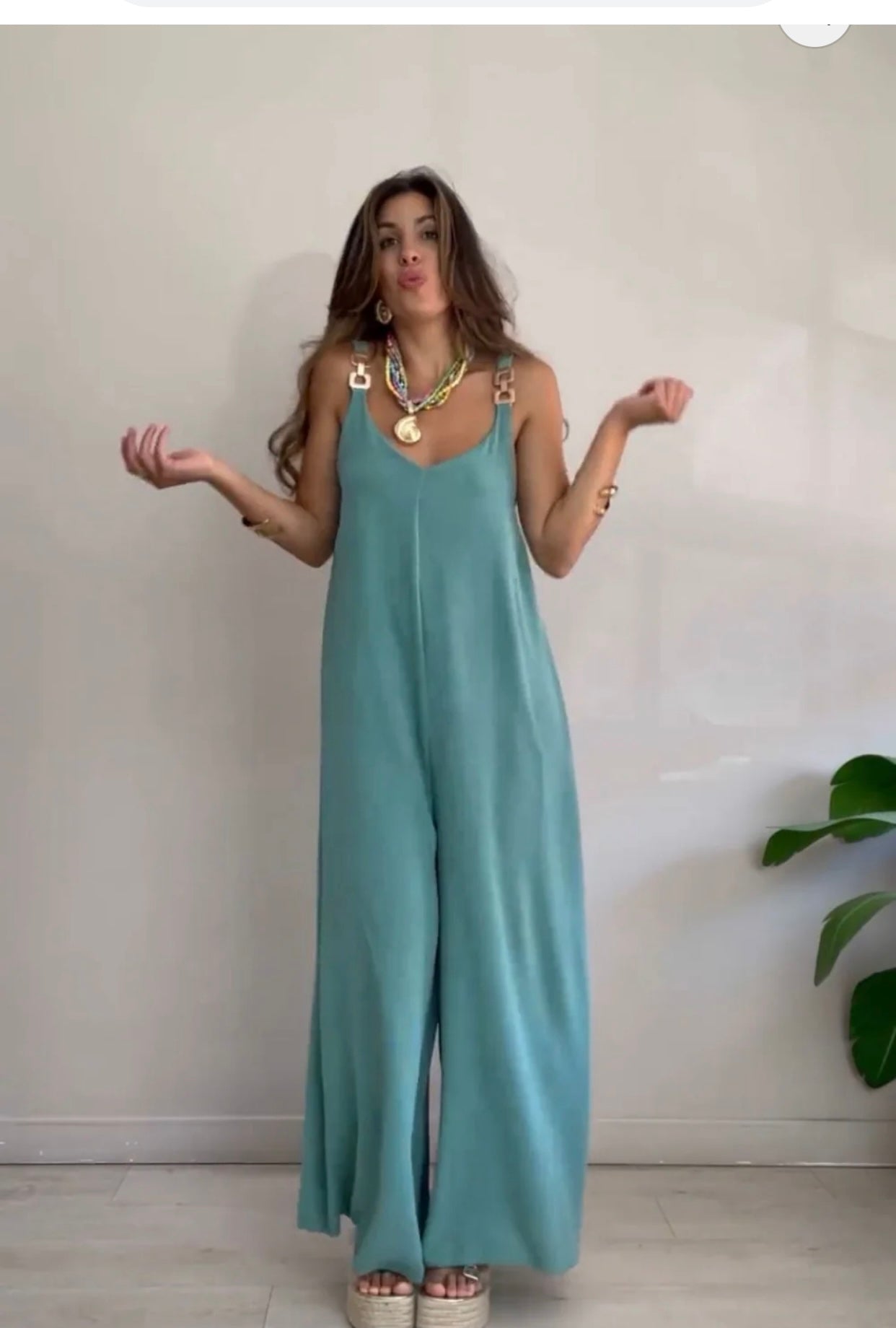 Iriana™ - Fluid jumpsuit with gold buckles