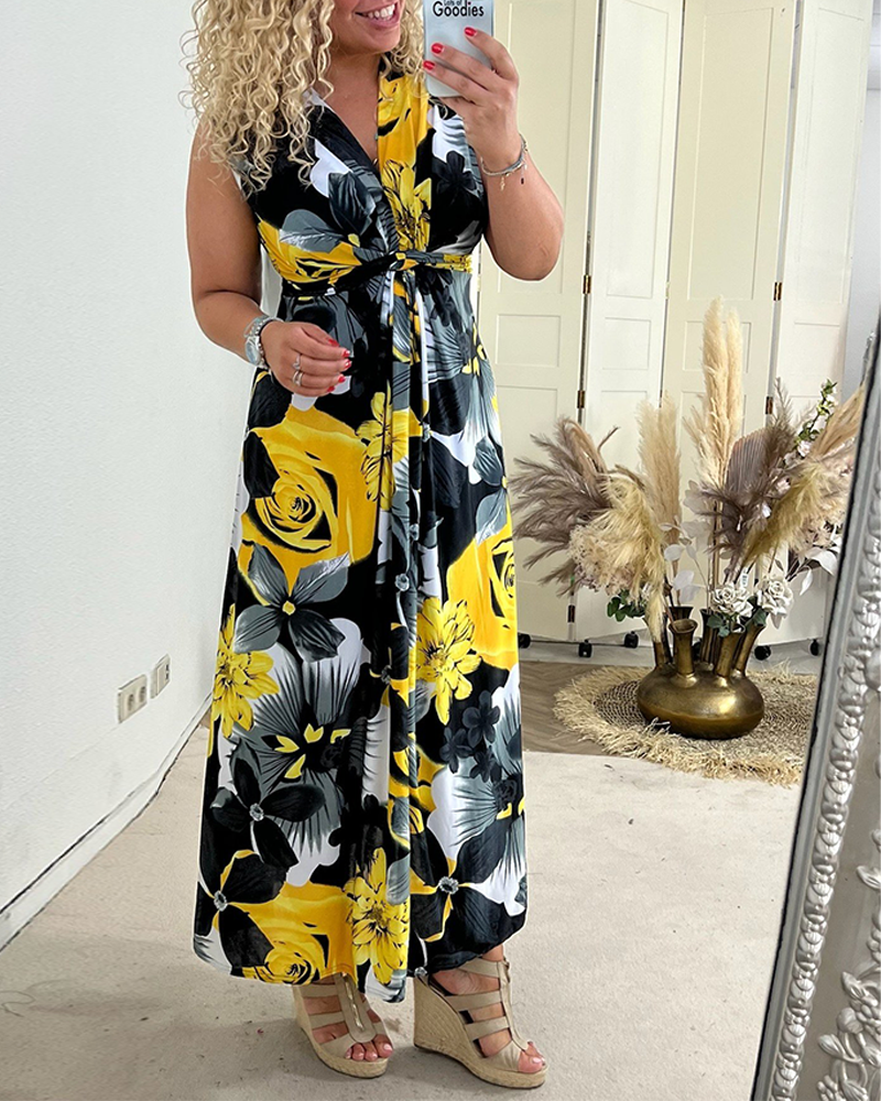 Sacha - Elegant sleeveless pleated floral print dress