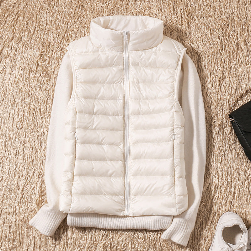 Quelora™ - Lightweight Pleated Gilet in Feathers for an Elegant Style