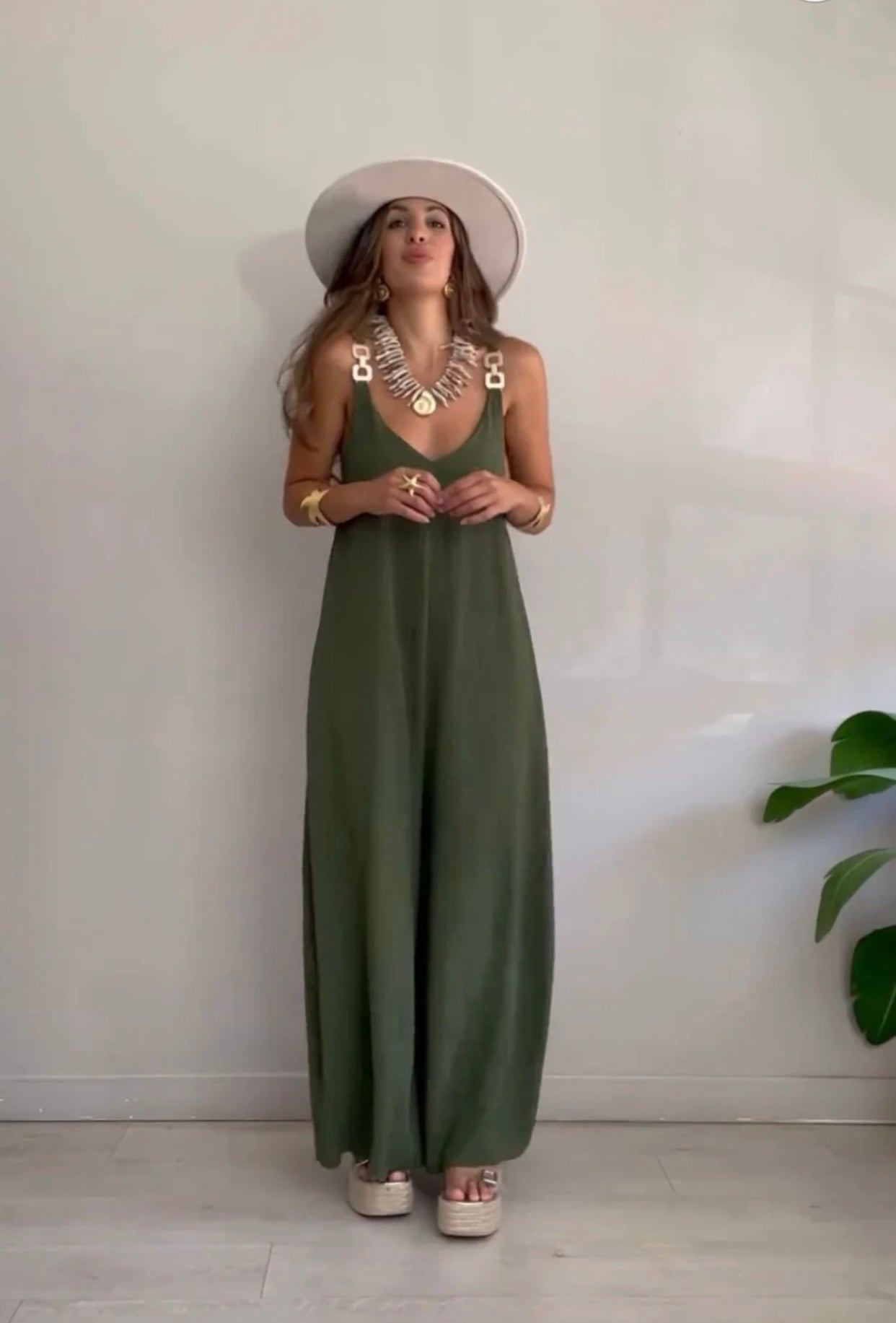 Iriana™ - Fluid jumpsuit with gold buckles