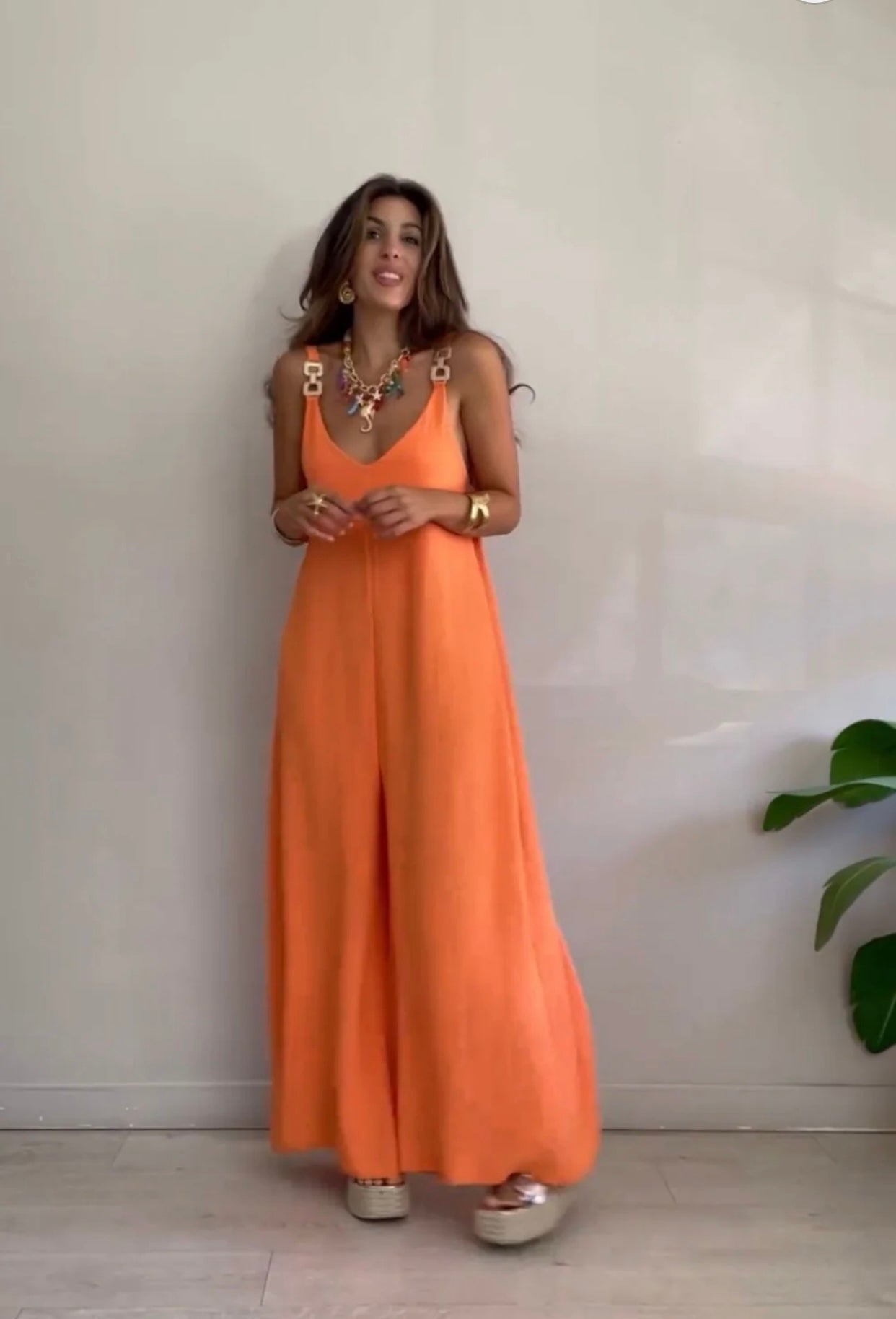 Iriana™ - Fluid jumpsuit with gold buckles