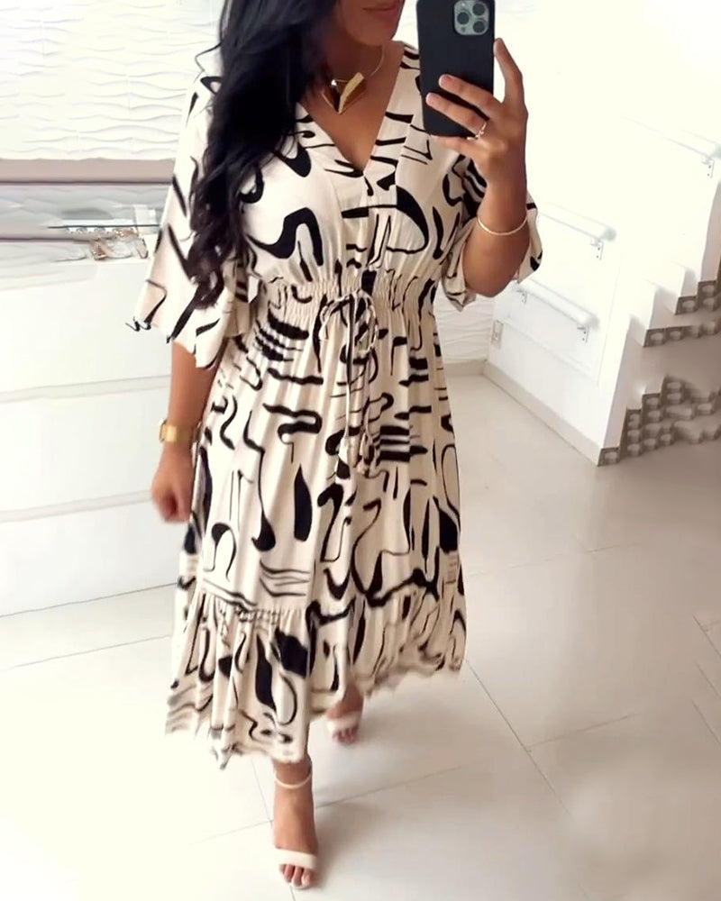 Sanae - Dress with V-neck and elegant print