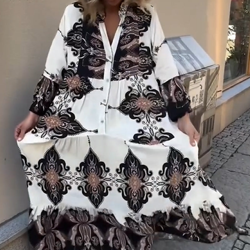 Anirelle - Elegant women's dress with a loose, flowing print, V-neck, and flared sleeves