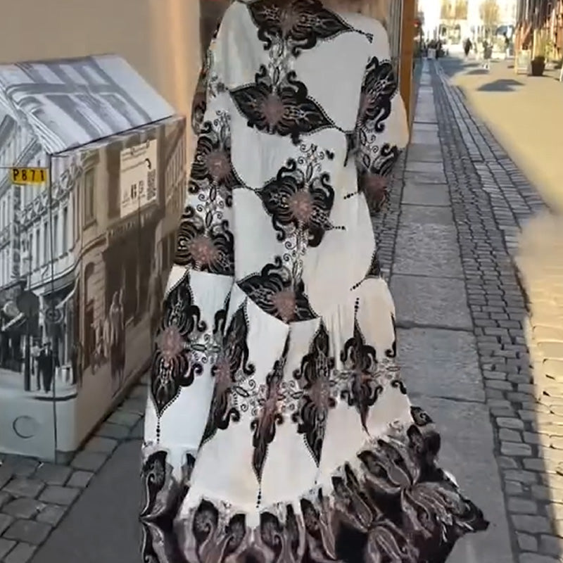 Anirelle - Elegant women's dress with a loose, flowing print, V-neck, and flared sleeves