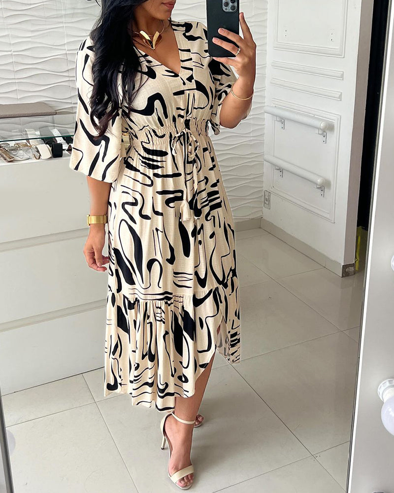 Sanae - Dress with V-neck and elegant print