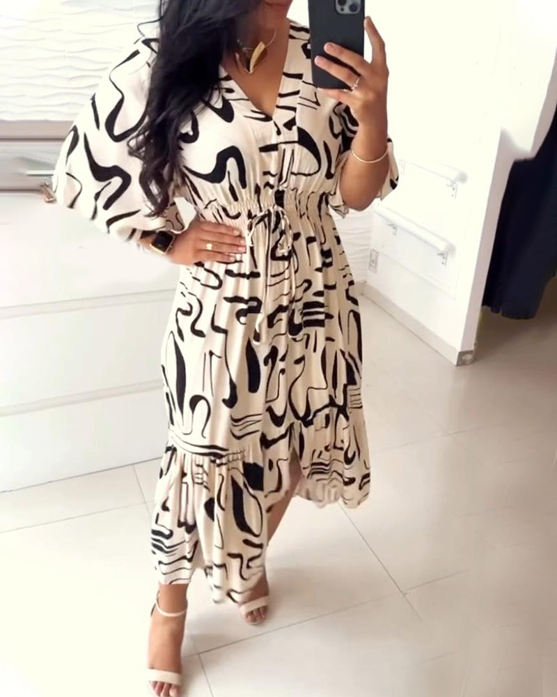 Sanae - Dress with V-neck and elegant print