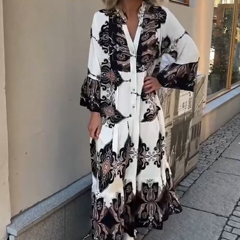 Anirelle - Elegant women's dress with a loose, flowing print, V-neck, and flared sleeves